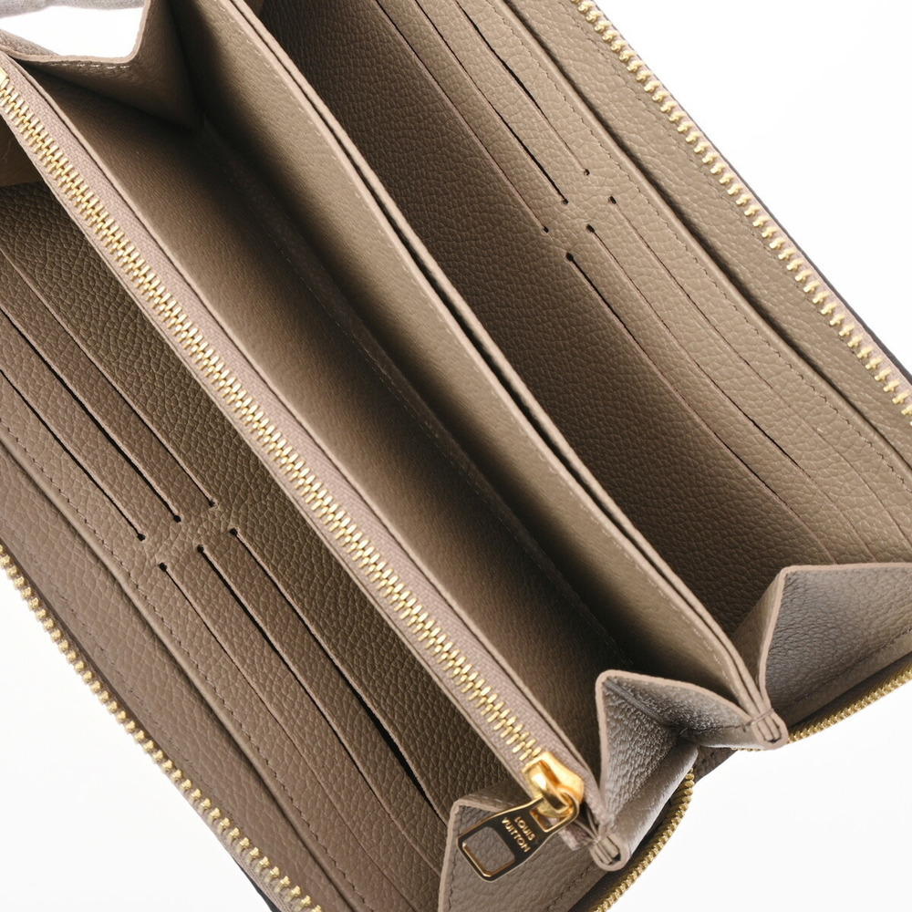 Louis Vuitton Bicolor Empreinte Zippy Wallet Tourtrail Creme Long - Picture 8 of 15